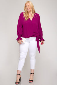 Smocked long sleeve surplice woven top